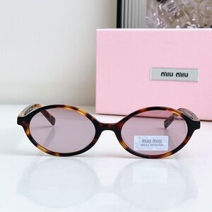 Miu Miu Tortoise Shell Sunglasses with Lavender Lenses